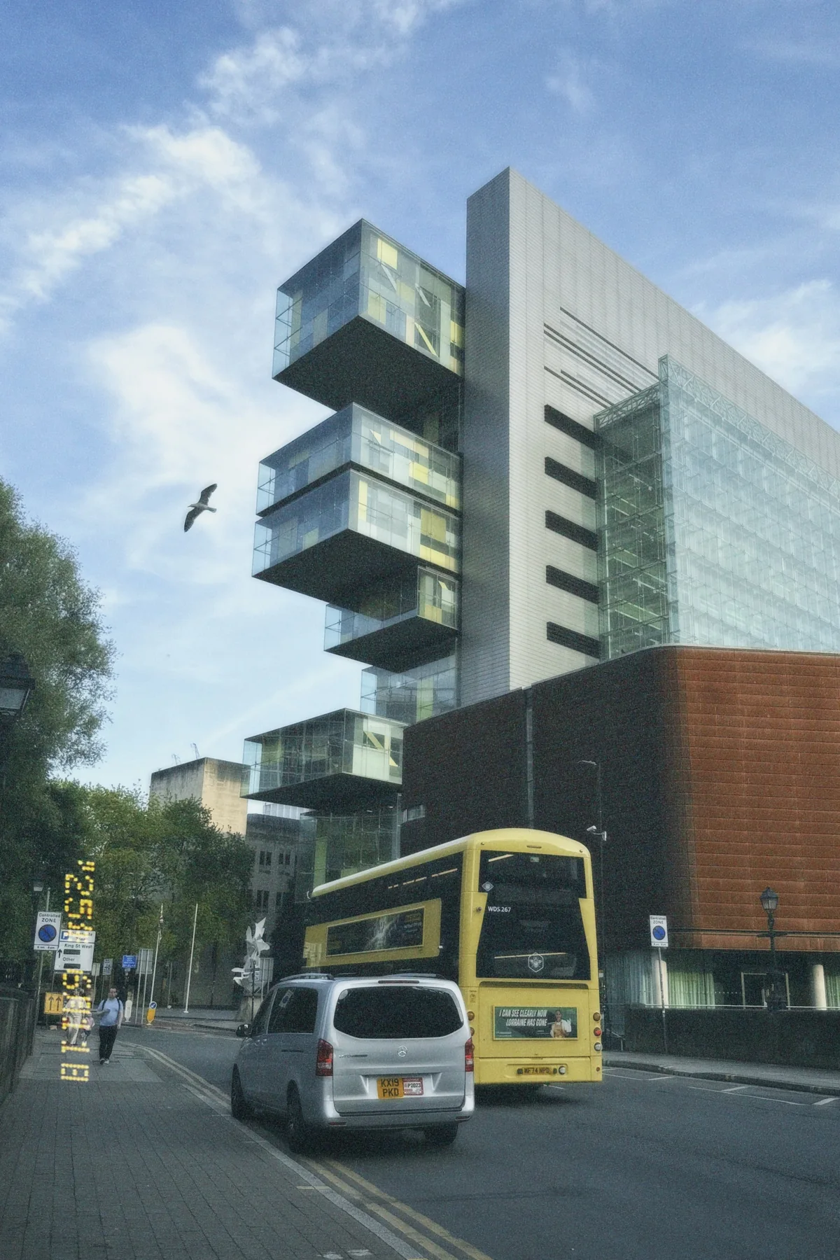 Bus in a Glass City, photographed in Manchester in 2025