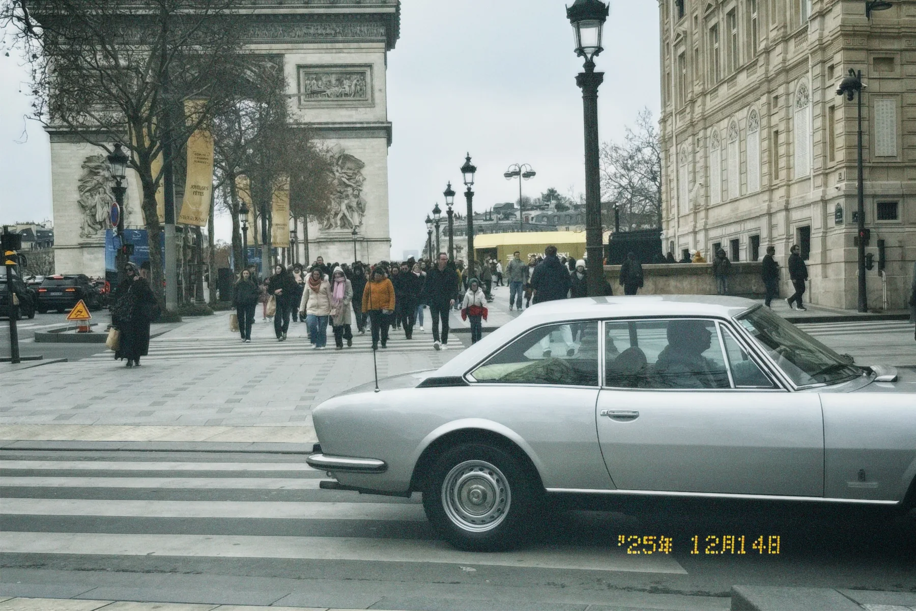 Car at the Arc, photographed in Paris in 2025